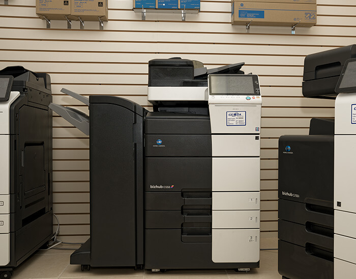 A room with various printers, showcasing copying and printing services in Daytona Beach, FL.